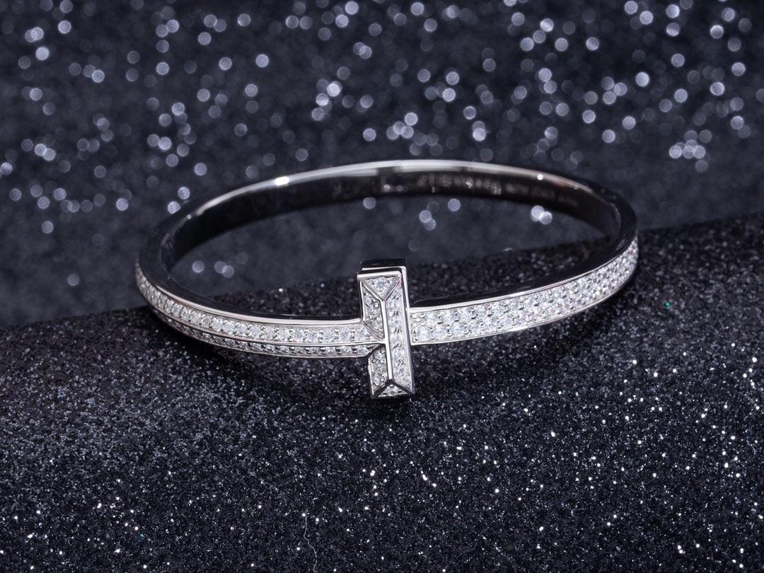 Tiffany Wide Cubic Zirconia Hinged Bangle Silver