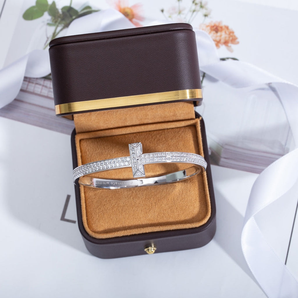 Tiffany Wide Cubic Zirconia Hinged Bangle Silver