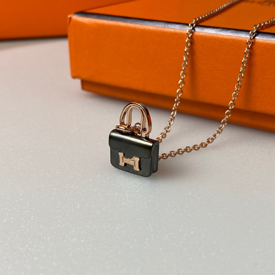 Hermes Constance Black Pendant Pink Gold Necklace