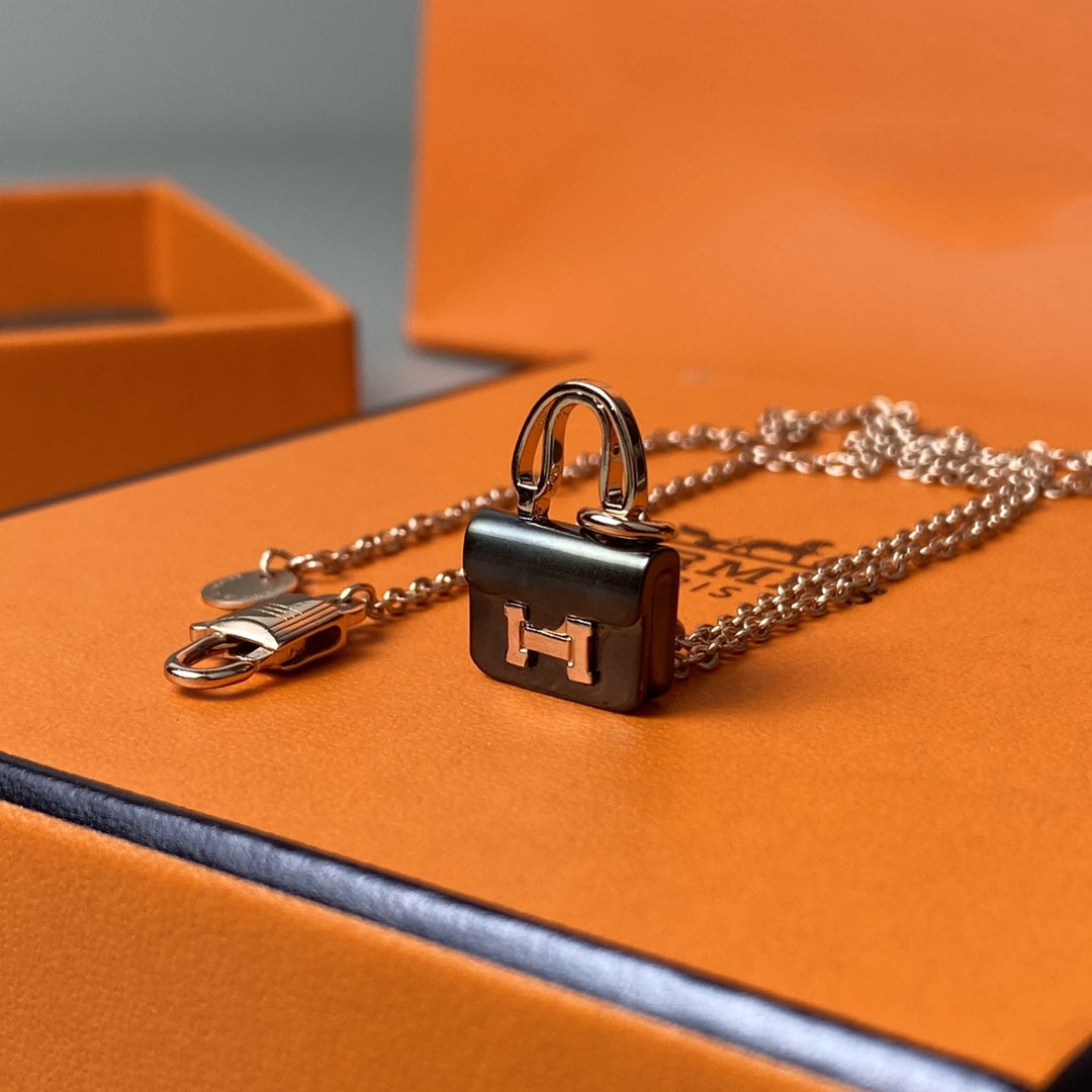 Hermes Constance Black Pendant Pink Gold Necklace