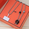 Hermes HM Black Circle Silver Necklace