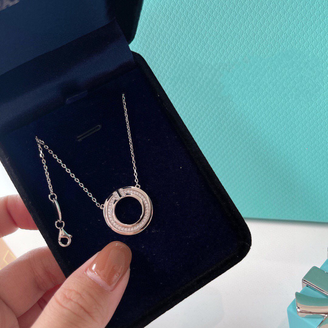Tiffany Cubic Zirconia and Mother of Pearl Circle Pendant