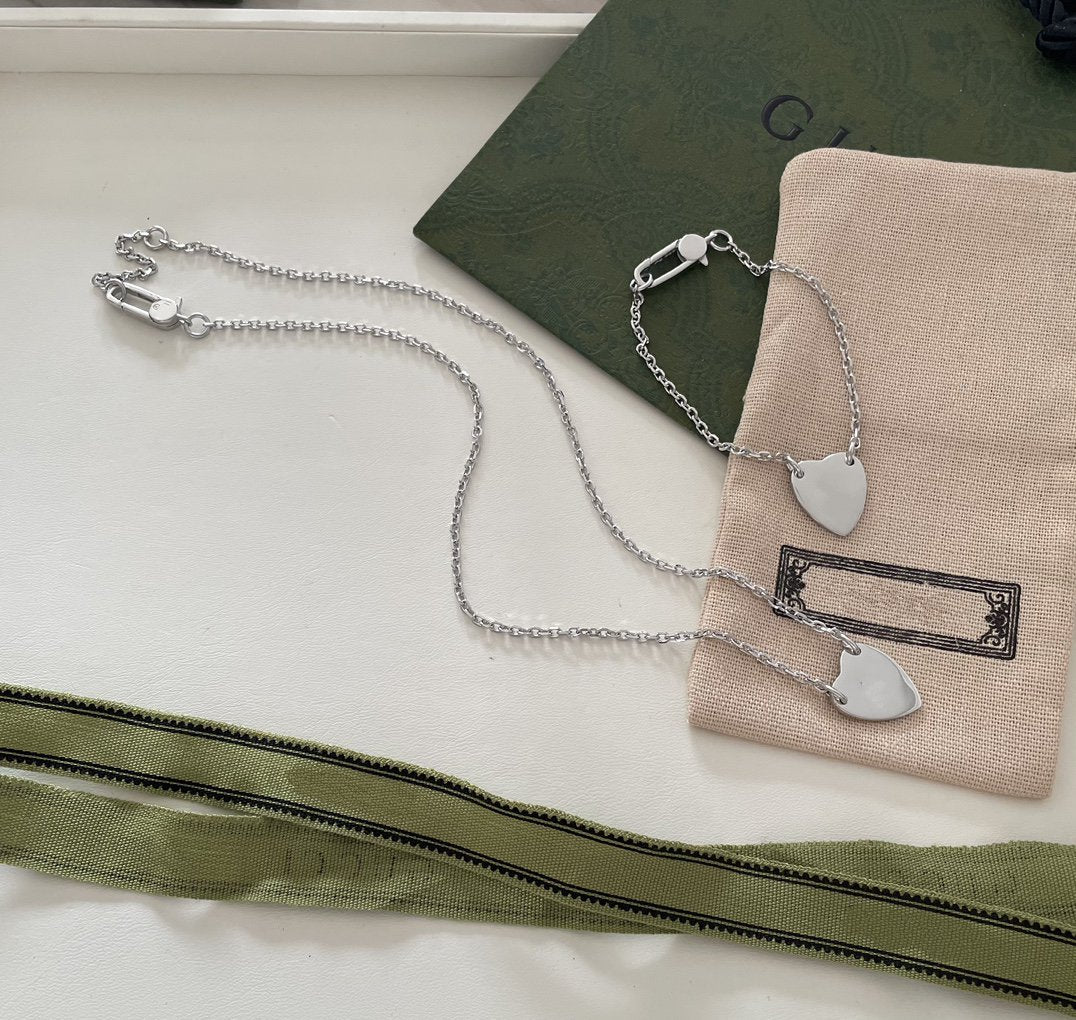 Gucci GG Logo Heart-Shaped Pendant Silver Bracelet