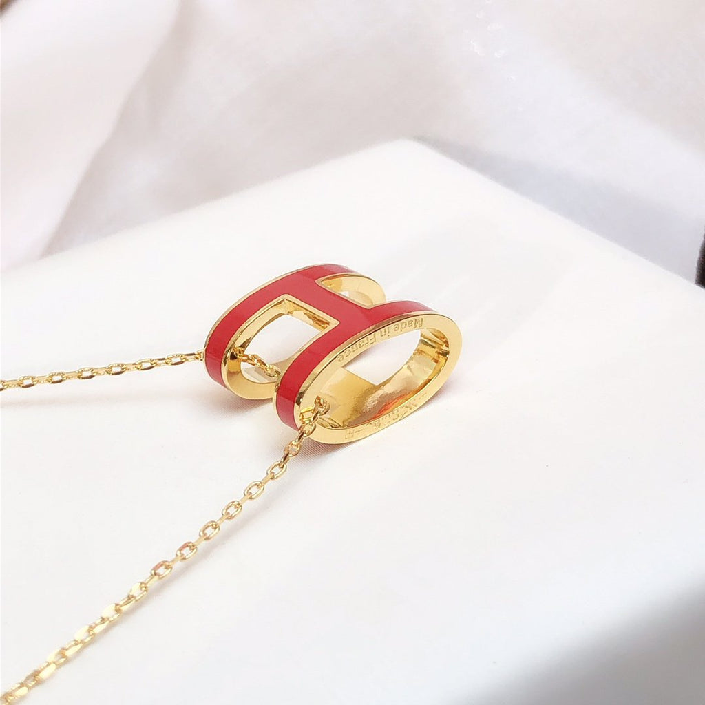 Hermes HM Clic Red Enamel Gold Necklace