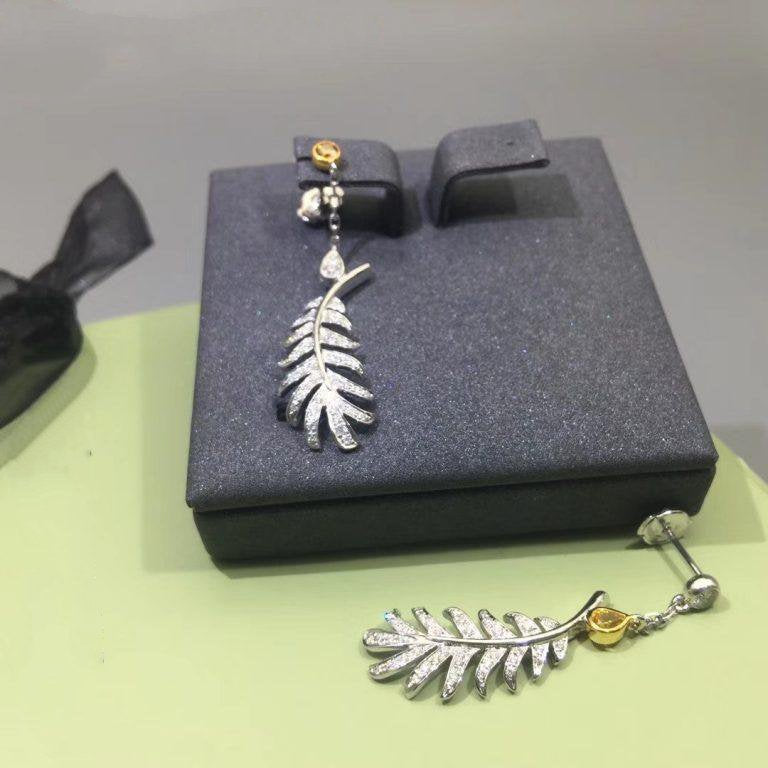Chanel Plume de Earrings Silver Diamond